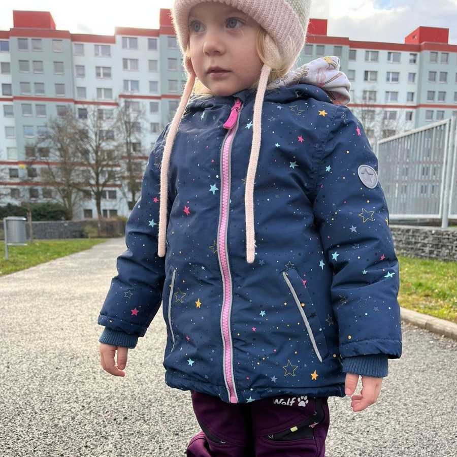 Spokojená zákaznice v softhellových kalhotách Wolf